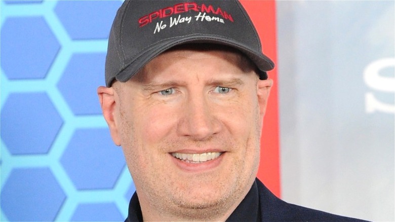 Marvel boss Kevin Feige posing for cameras