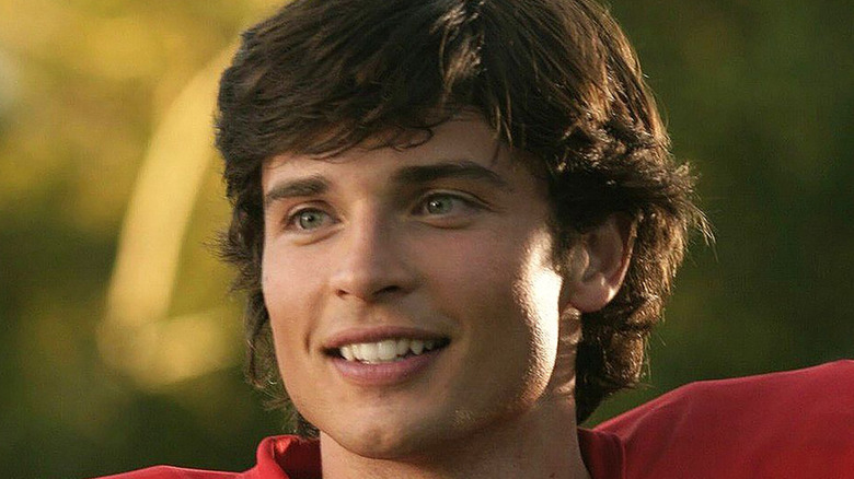 Tom Welling smiling as Clark Kent