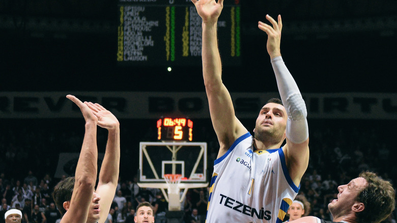 Dane DiLiegro playing basketball