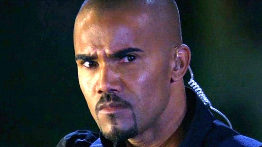 Derek Morgan with earpiece