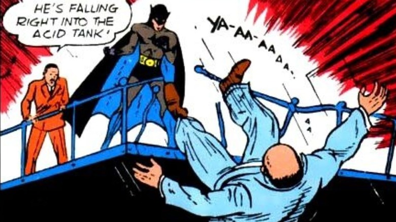 Batman knocking a criminal into an acid tank