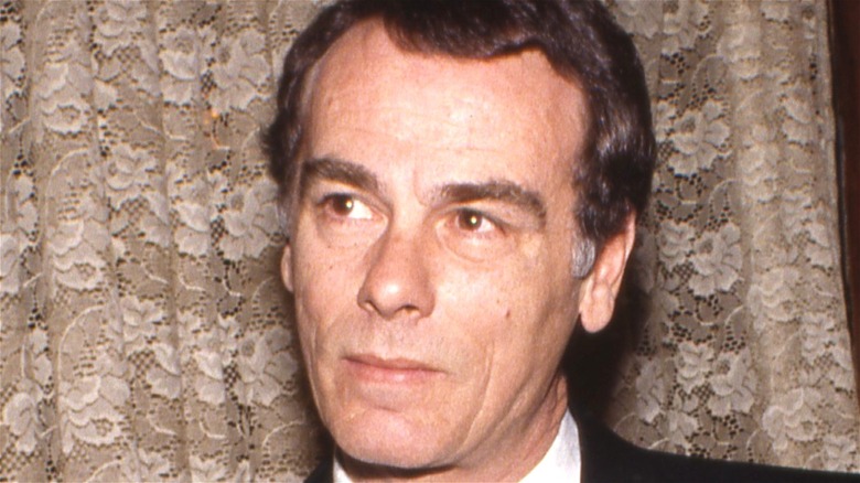 Dean Stockwell smirking 