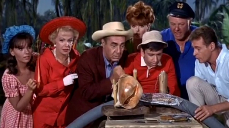 Gilligan's Island cast huddled