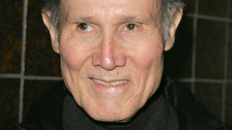 Henry Silva smiling