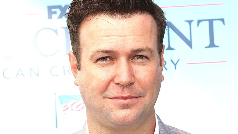 Taran Killam looking into camera