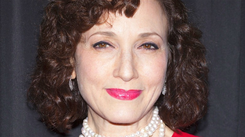Bebe Neuwirth smiling