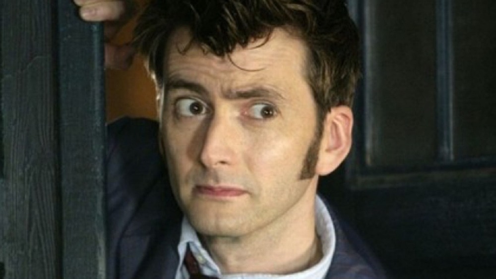 The Tenth Doctor peering