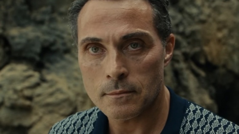 Rufus Sewell smirking in Old