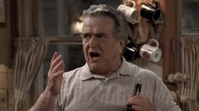 George Carey raises his hand and yells on The Drew Carey Show