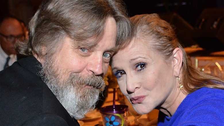 Mark Hamill and Carrie Fisher smiling