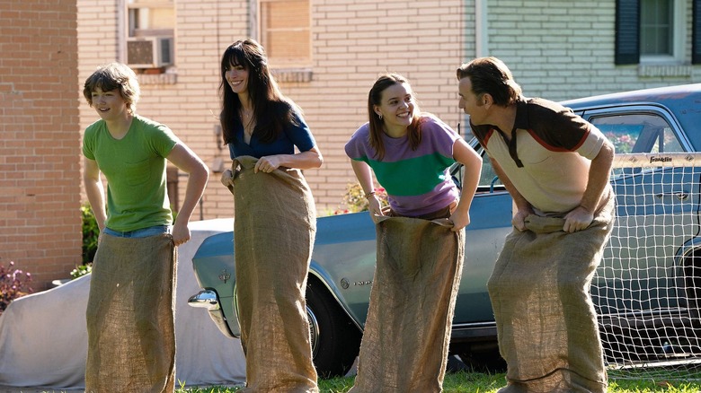 the Platts take part in a sack race in The End of Oak Street (2026)