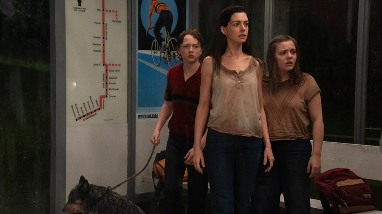 Denise, Audrey and Brian at the bus stop in The End of Oak Street (2026)