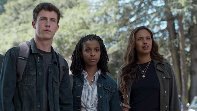 Clay holding a knife