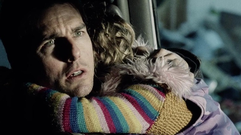 Ray holding Rachel in car