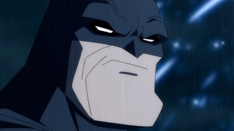 Batman scowls