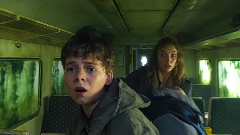 Spike and Isla on a train in 28 Years Later