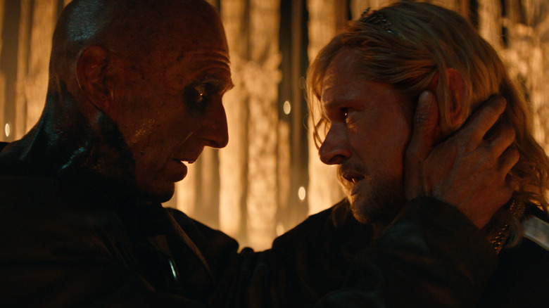 Dr. Kelson holding onto Jimmy Crystal's head in "28 Years Later: The Bone Temple" (2026)