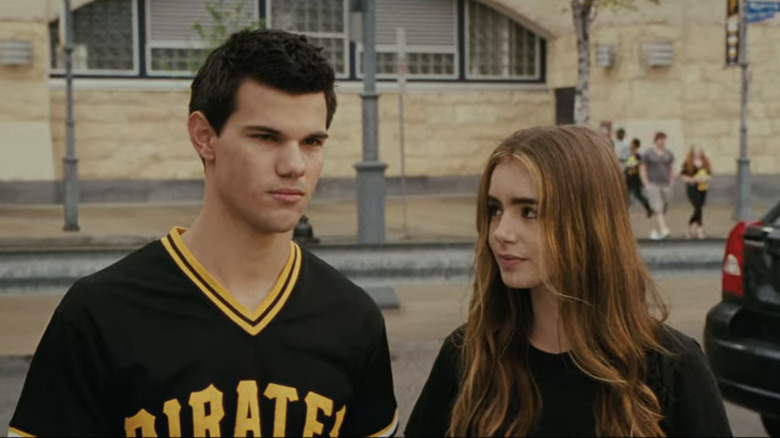 Nathan and Karen walking away from school