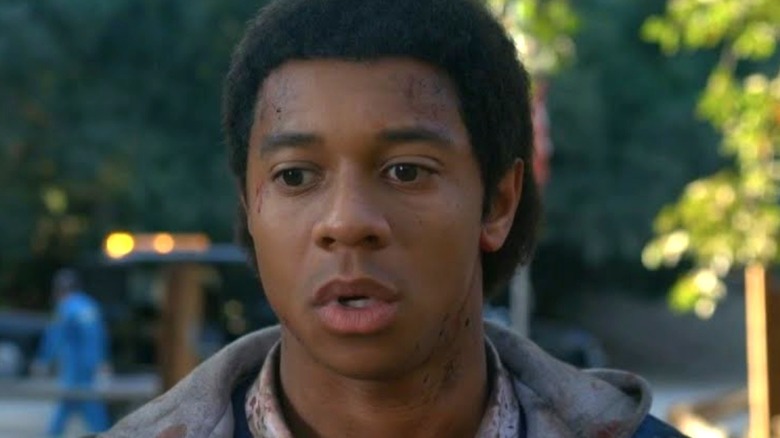 ECU of DeRon Horton with blood on his face as Ray in AHS