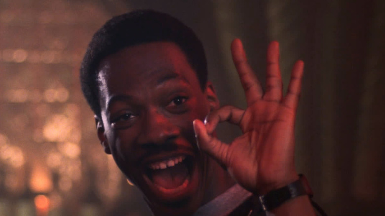 Axel holding up an OK sign