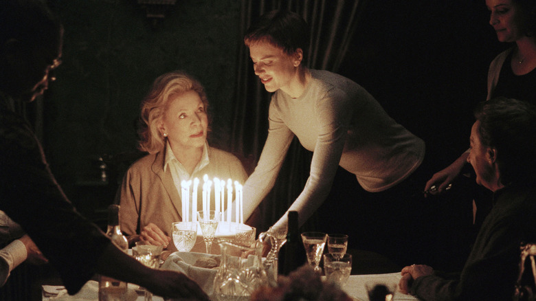 Anna presents Eleanor with a cake in "Birth" (2004)