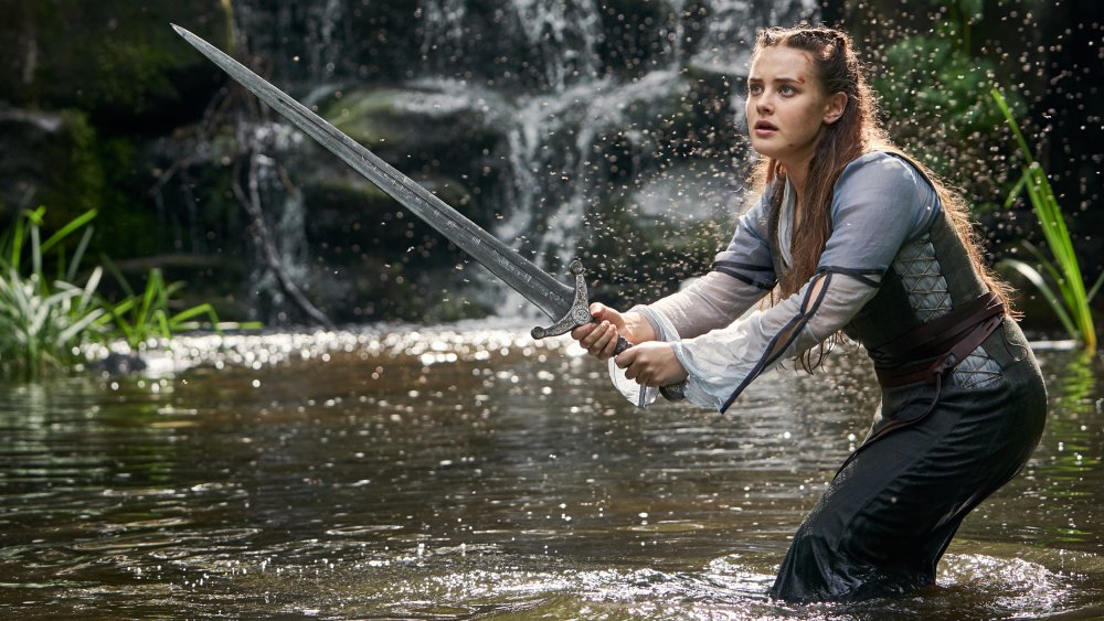 Katherine Langford as Nimue holding Excalibur on Cursed