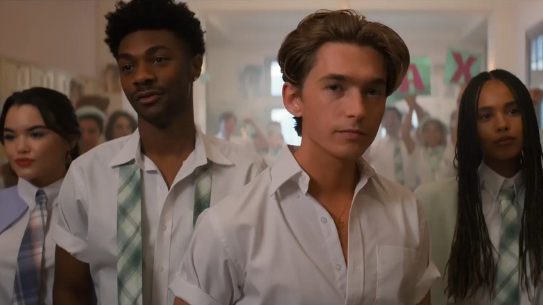 Max with his shirt unbuttoned
