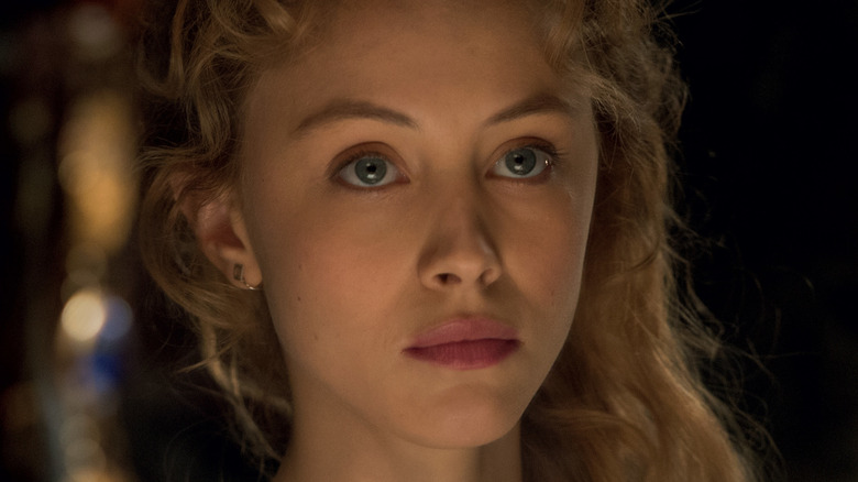 Sarah Gadon stares