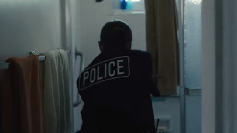 Officers raiding Emily's apartmnent