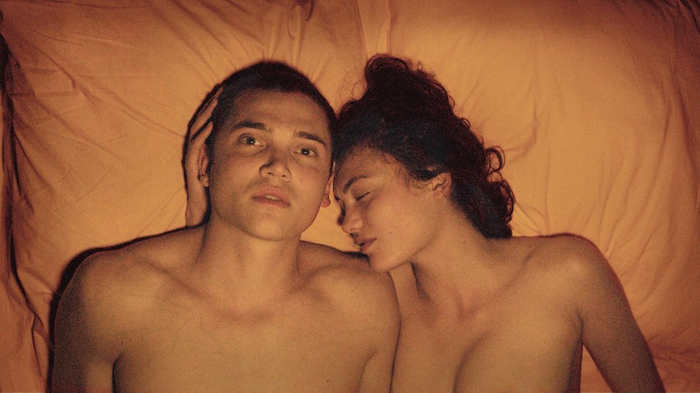 Karl Glusman and Aomi Muyock as Murphy and Electra in Love