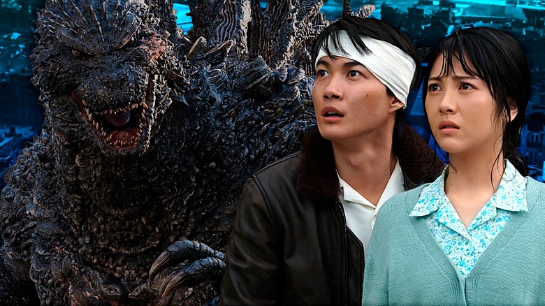 Koichi and Noriko stare at Godzilla