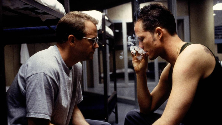 Two inmates talk