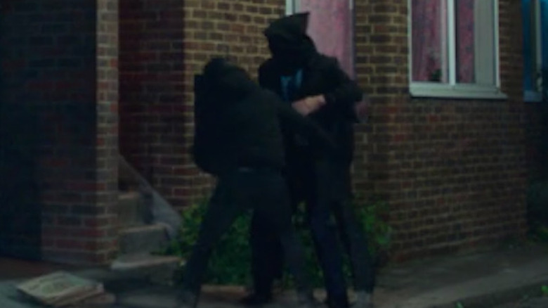 Two unseen men abducting Jerry
