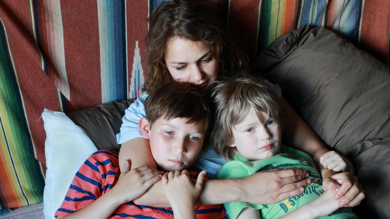 Sanna cuddles her boys in "Jack" (2014)