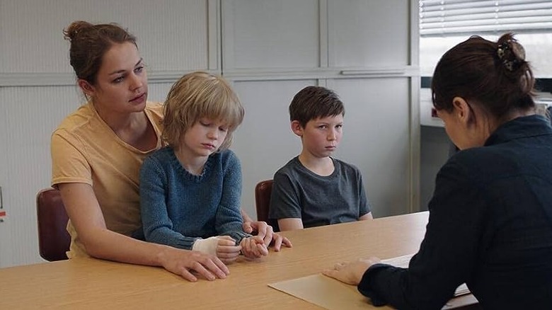 Sanna is interviewed by social services in "Jack" (2014)