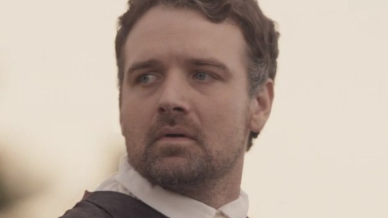 Kevin frowning