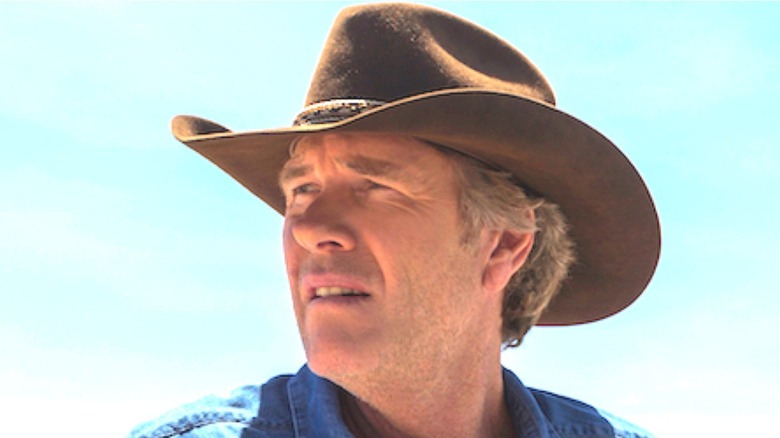 Longmire stares into distance