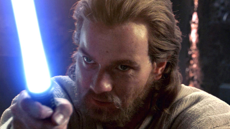 Obi-Wan Kenobi holding lightsaber