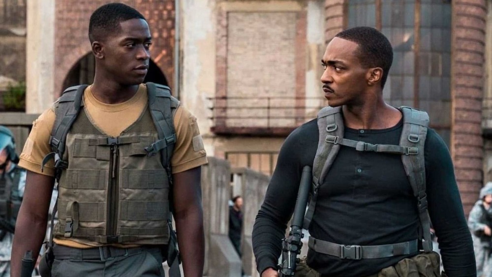 Damson Idris and Anthony Mackie walking