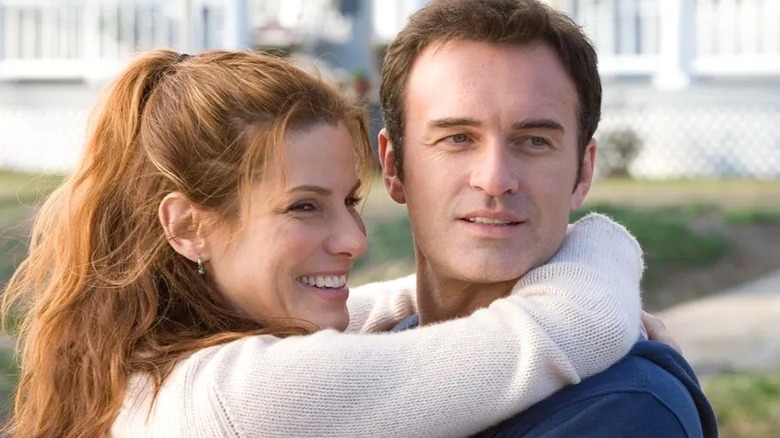 Linda hugging her husband in Premonition