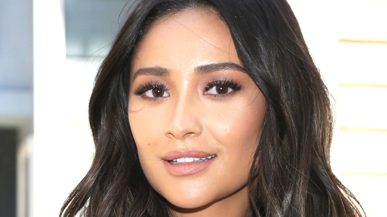Shay Mitchell smiling
