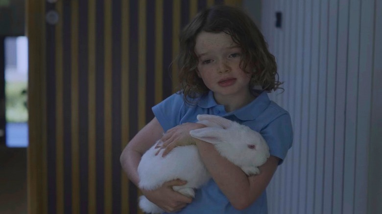 Mia holding white rabbit