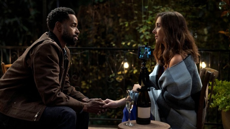 Sean and Ally hold hands