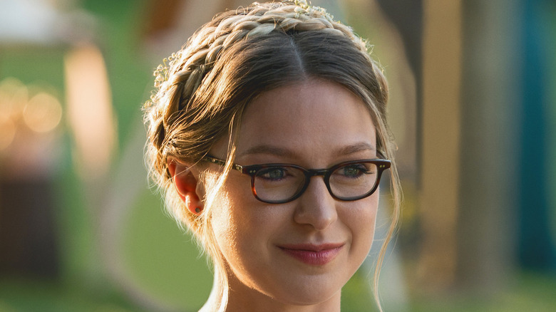 Kara in braids and glasses