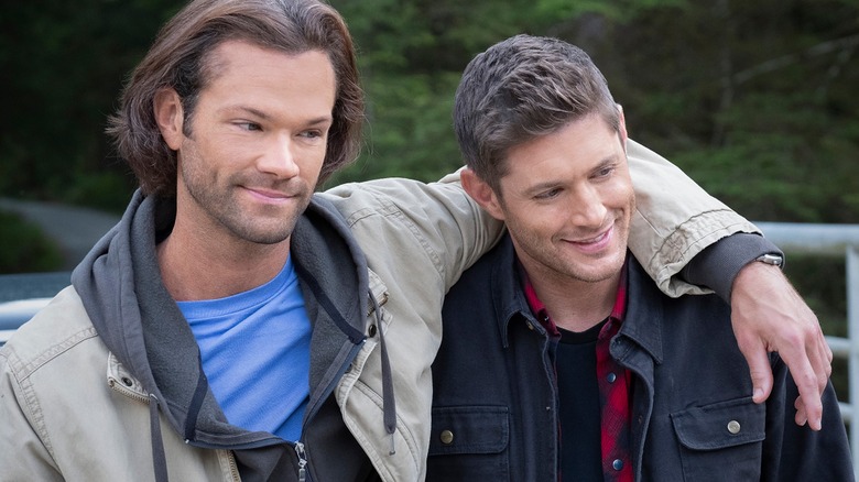 Sam with his arm around Dean