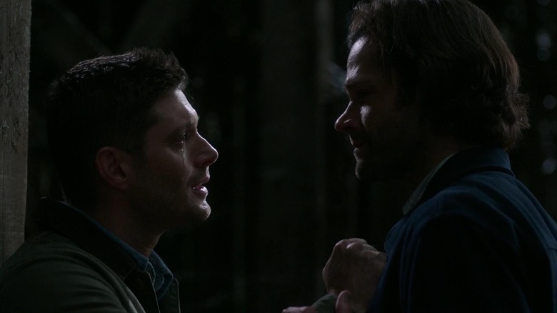 Dean crying with Sam