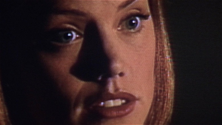 Tight zoom of Elisabeth Campbell on video talking