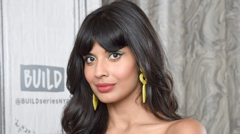 Jameela Jamil smiles