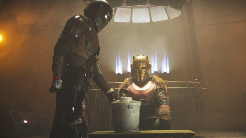 The Mandalorian brings his Beskar bounty to the blacksmith