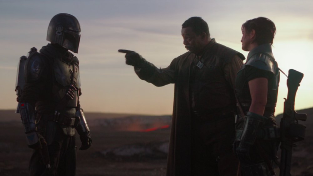 Pedro Pascal, Carl Weathers, and Gina Carano as The Mandalorian, Greef Carga, and Cara Dune